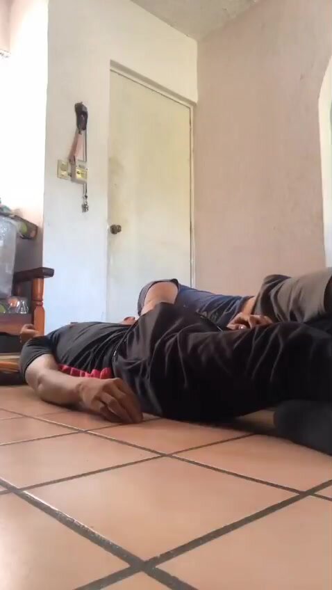 Friends kissing on the floor