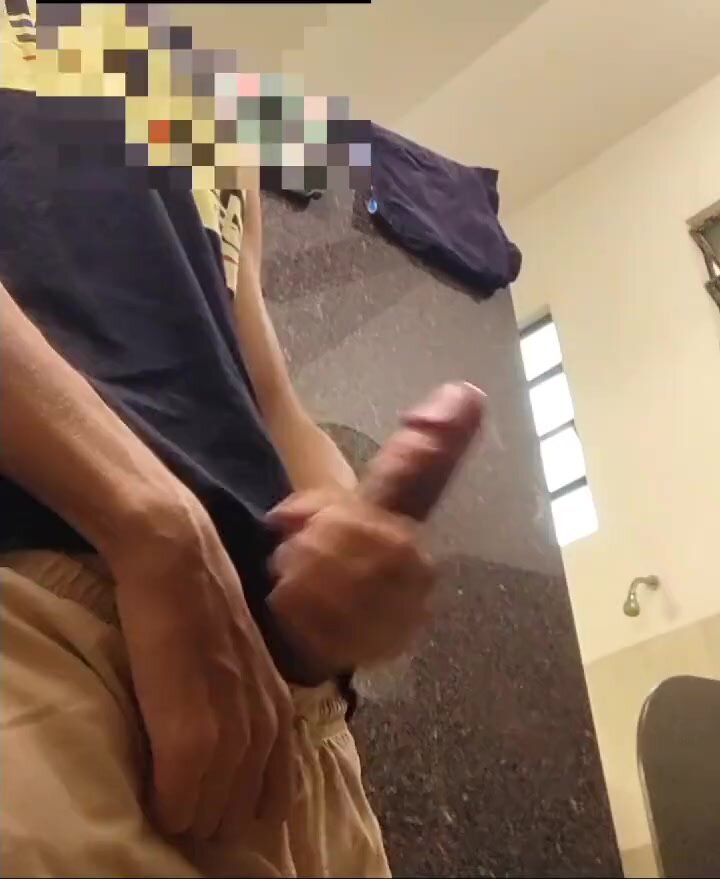 Hung teen jerks and cums in a public toilet