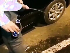 Hung stud takes a piss in a car park