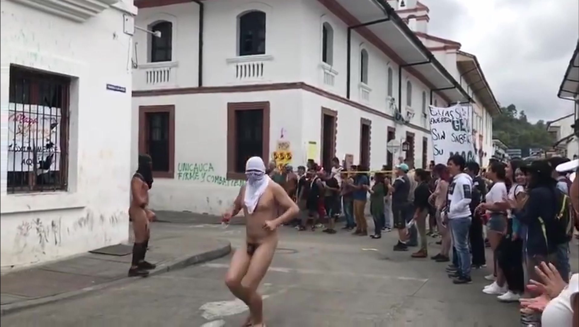 Young guys naked student protest