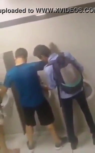 Short clip of hot cottaging at the urinal in a restroom