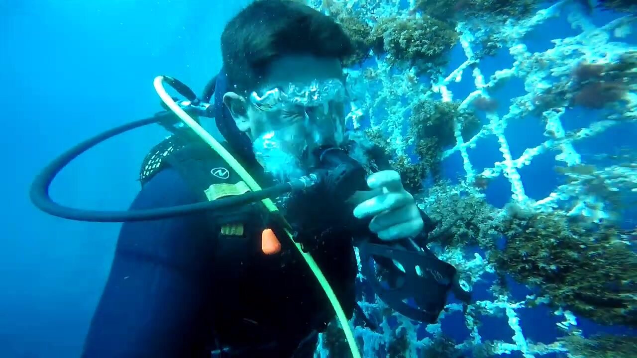Turkish scubadiver barefaced underwater