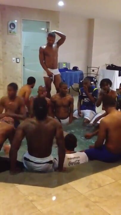 Soccer team celebrates in hot tub