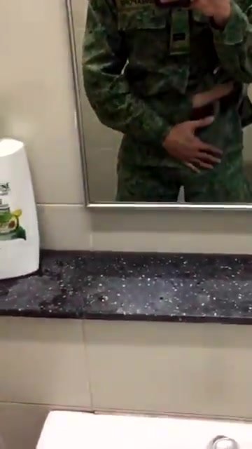SG NSF officer rubs bulge