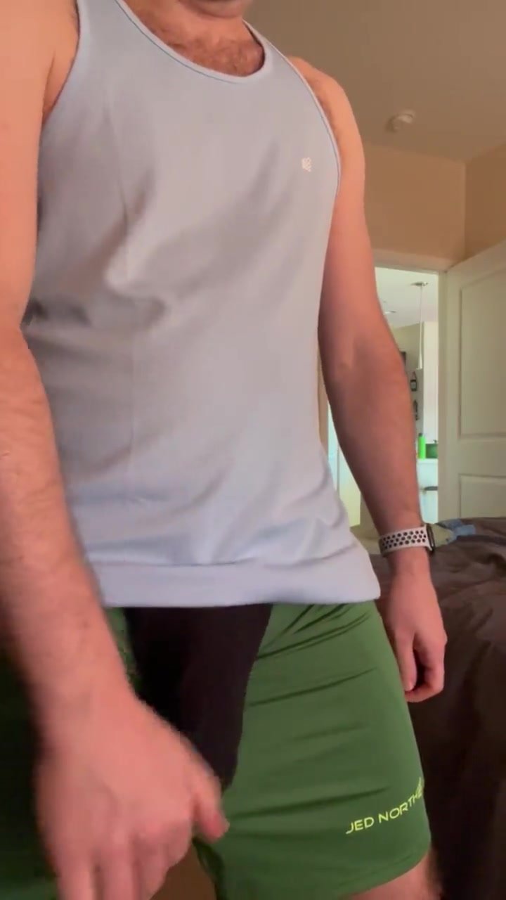 Daddy rubs huge heavy bulge through shorts