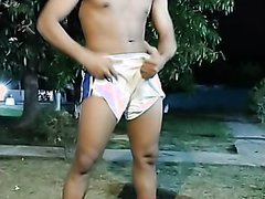 cute latino twink pissing in the bucket