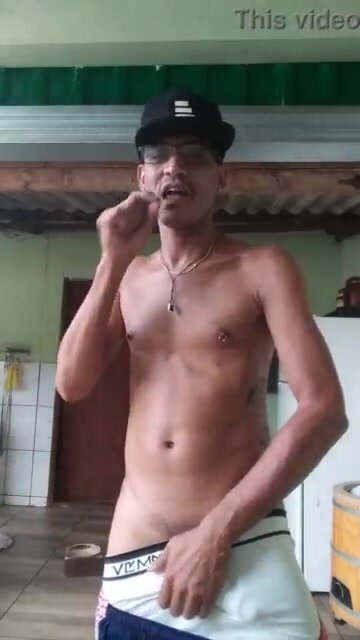 Sexy guy smokes while showing off his cock and body