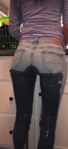 Girl pees in jeans - video 2