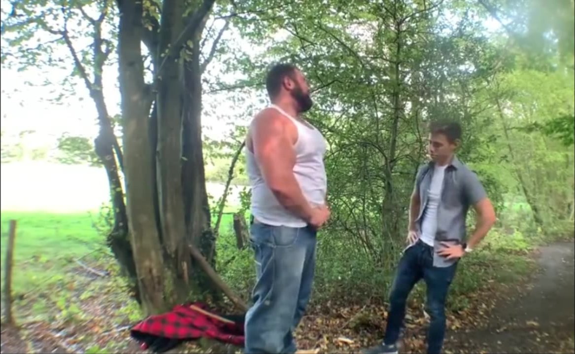 A giant and a twink in woods