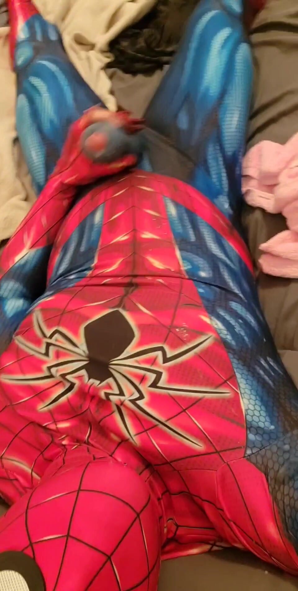 Spiderman shoots his web