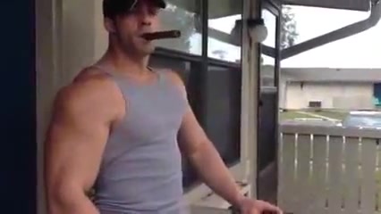 Muscle dude smoking