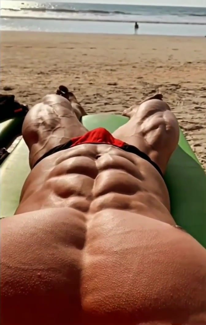 Flexing Abs on the Beach