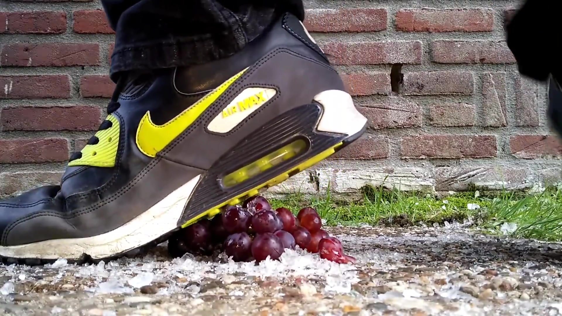 Spitting on grapes and then crushing them