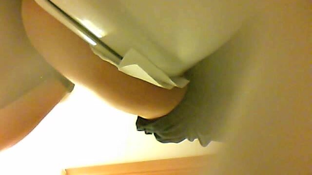 Attractive blonde pooping at work
