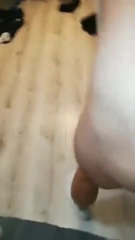 a guy cumming on his friend's ass