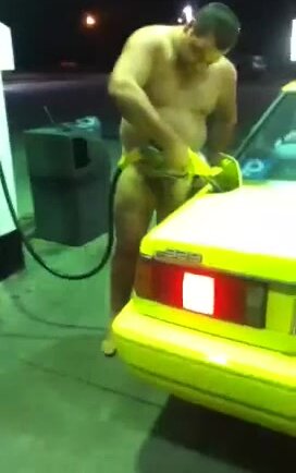 Chubby man reposting gasoline naked
