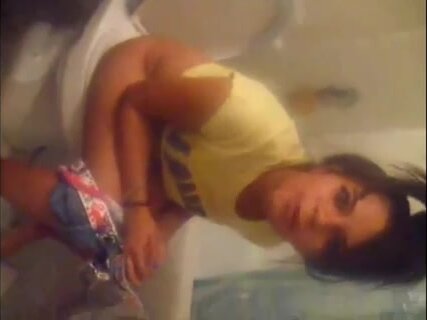 Girl peeing in toilet - video 3