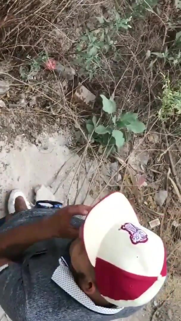 Latin man pissing