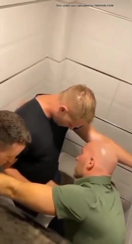 Four hot guys sucking and kissing in a toilet