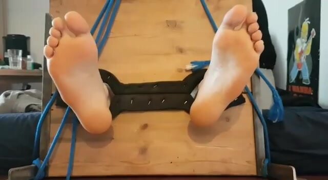 Male Feet Tickled in Stocks