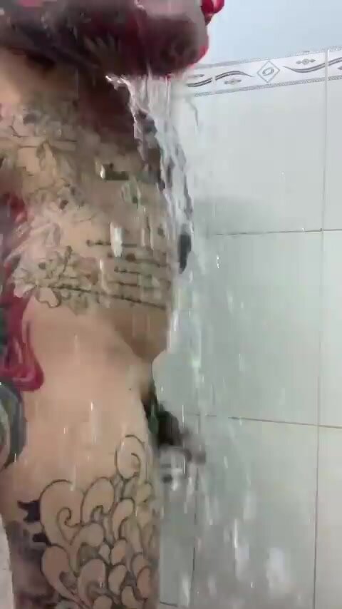 Tattoo guy shower