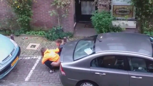 College Girls Caught Pissing Behind Their Car