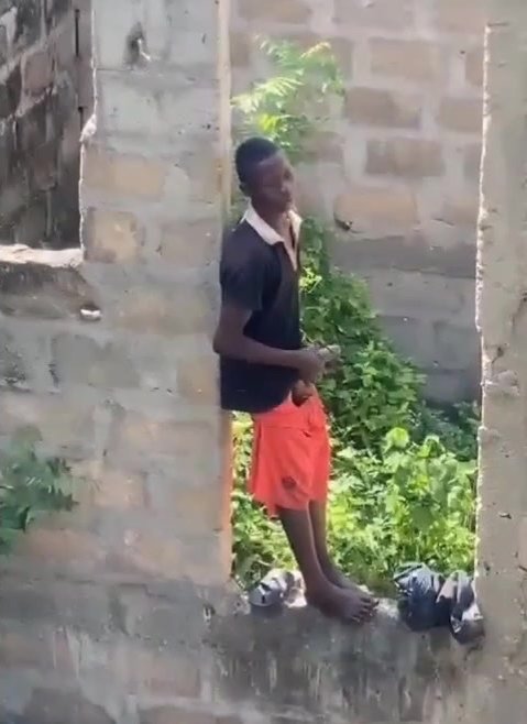 African Man Caught Jerking Outside Someone's House