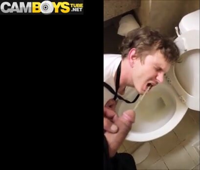 Boy and drinking piss on toilet