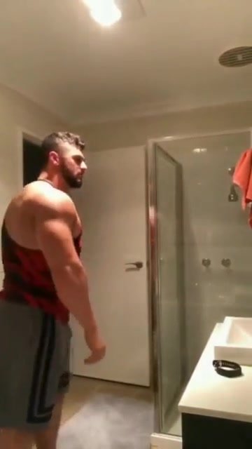 Fit gay poses in bathroom and shows ass