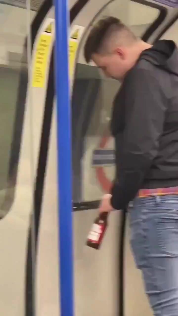 lad pisses on the tube