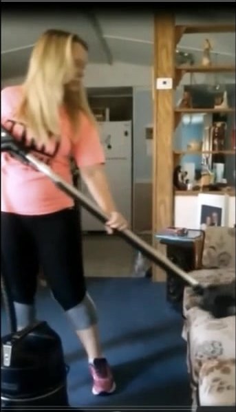 Alli in slow -motion making the vacuum moan