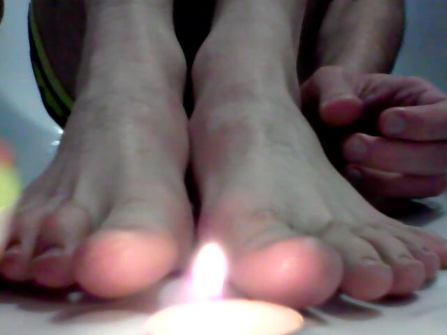 Feet by candlelight.