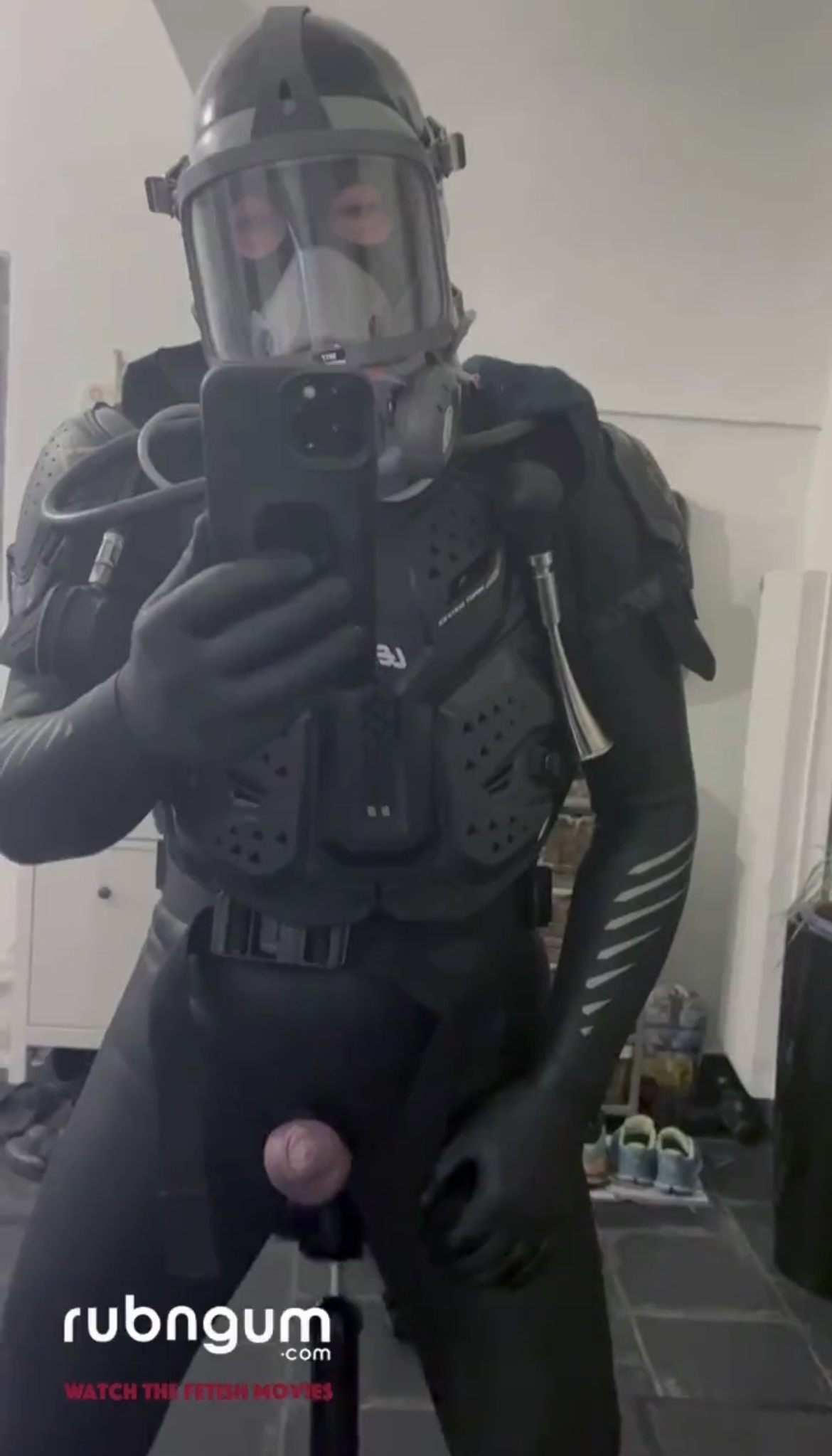 Gay rubber drone with fuck machine
