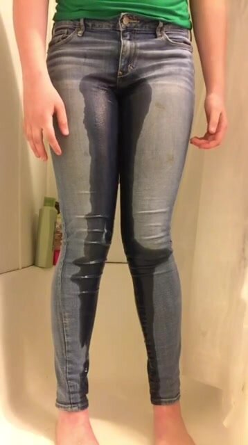 She wets her jeans in the tub