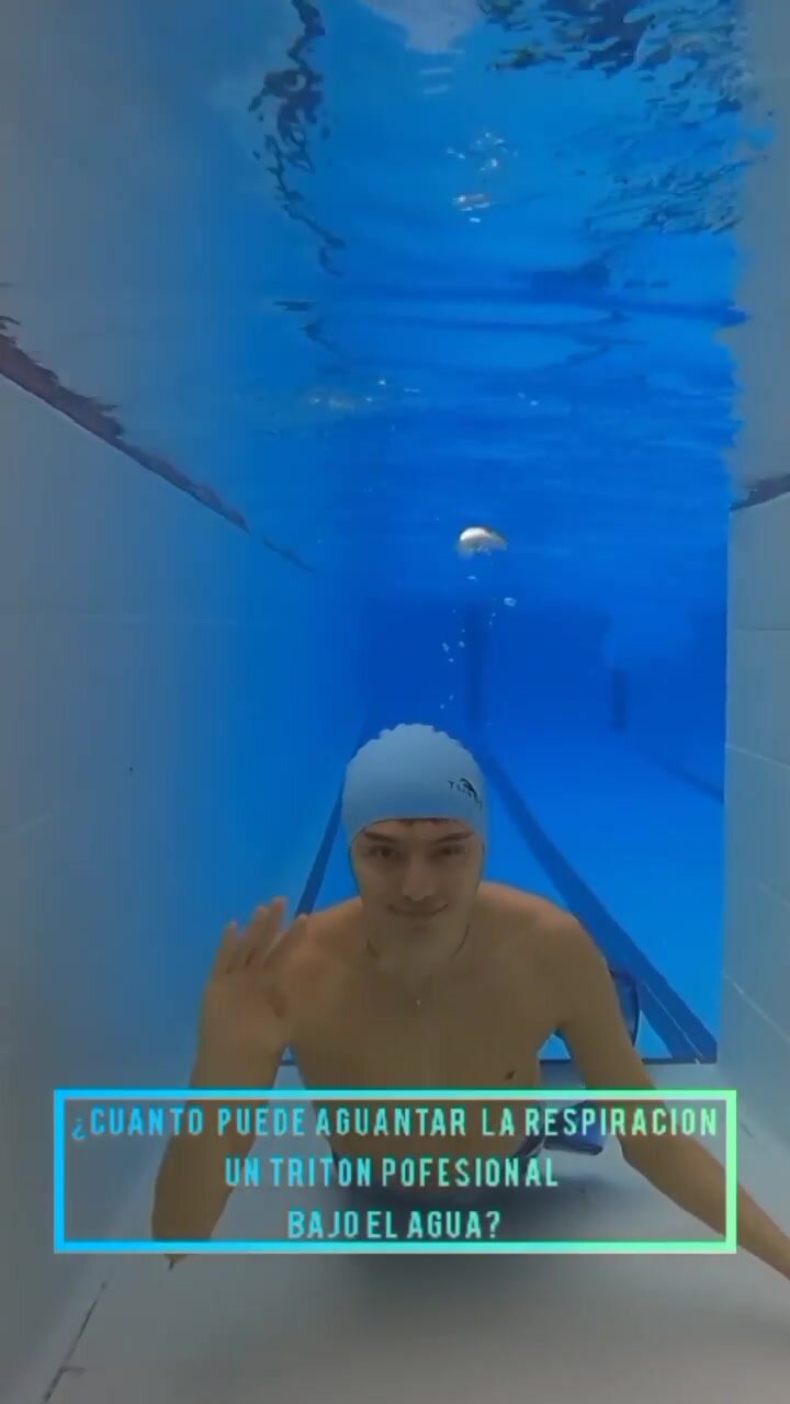 Underwater barefaced merman with swimcap