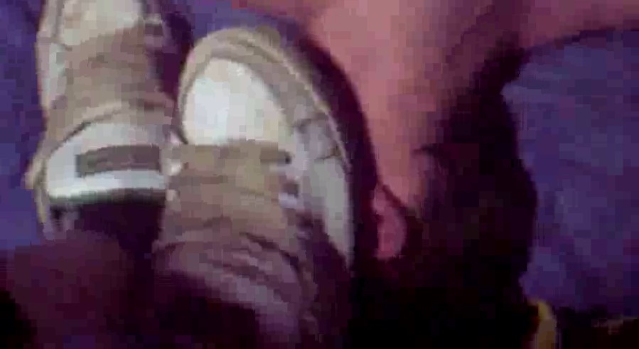 Skater grinding sneaker treads into slave's face - burning