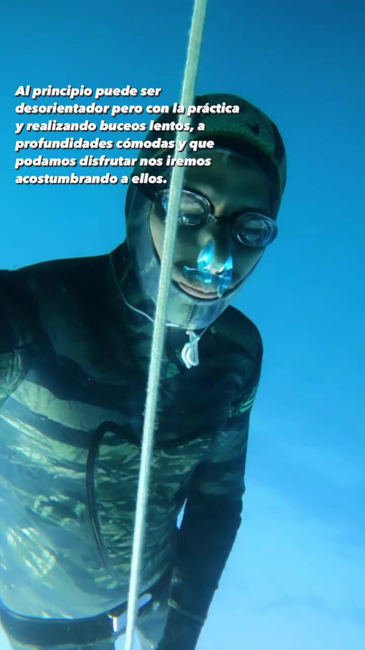 Tight wetsuit and fluid goggles underwater