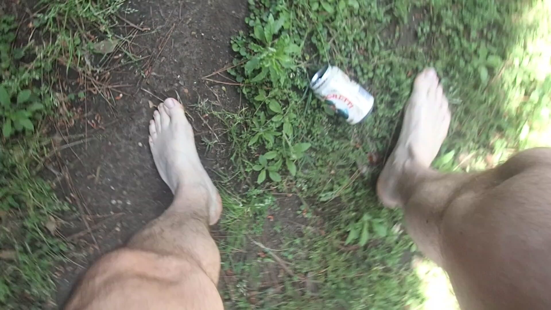 BAREFOOT CANS SMASHING ON GRASS