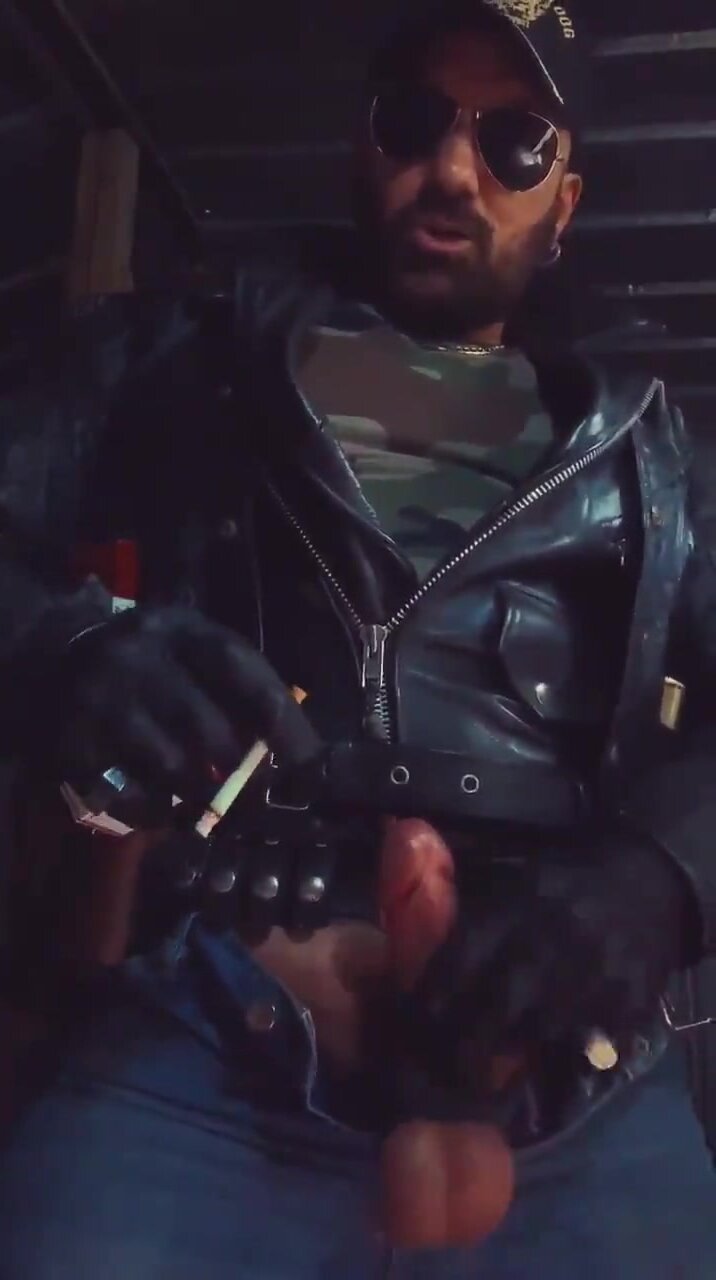 Leather dad shows off his smoke dong