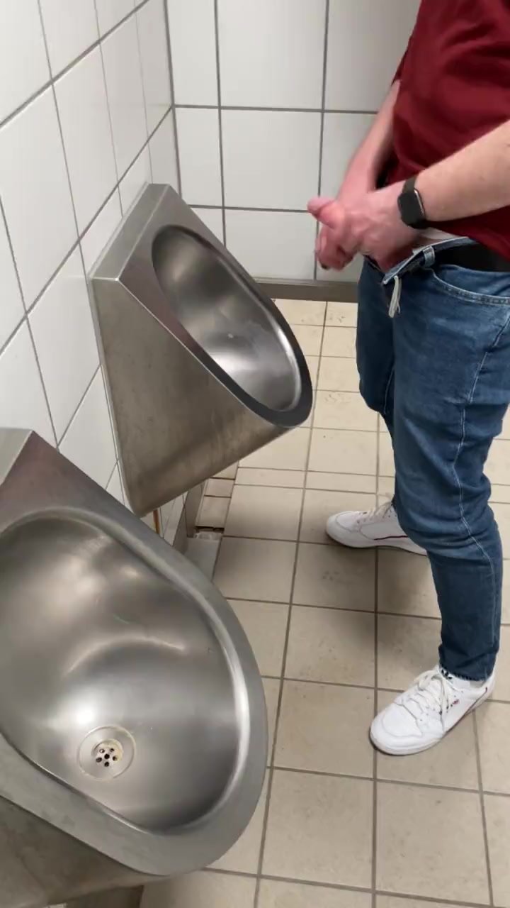 Guy Jacking it at Urinals
