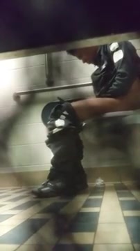 Short black guy plops