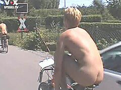 stripping off on a bike