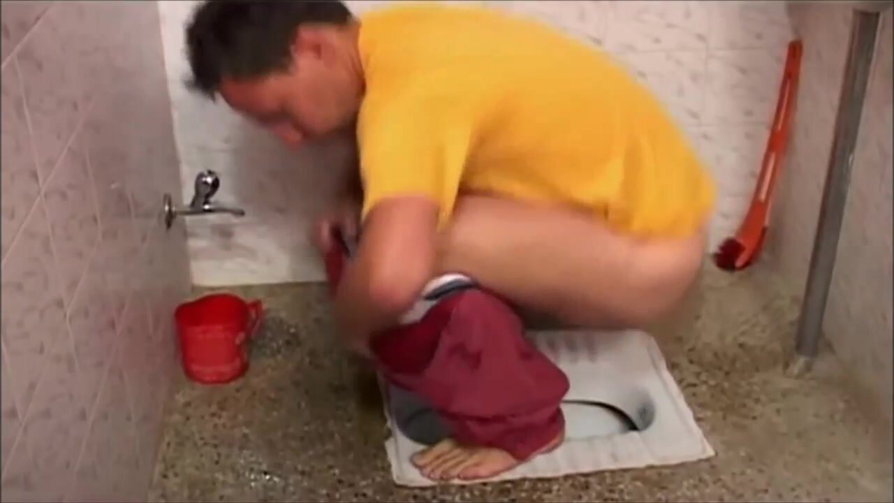 Toilet scene squat guy
