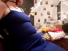Belly Inflation in a Blue Dress