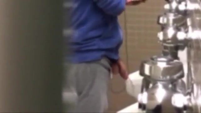 Nice young guys pissing at urinals