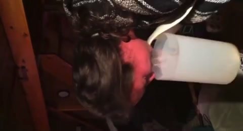 Girl vomits a drink