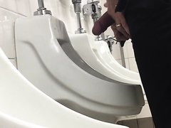 Daddy too shy at the Urinal
