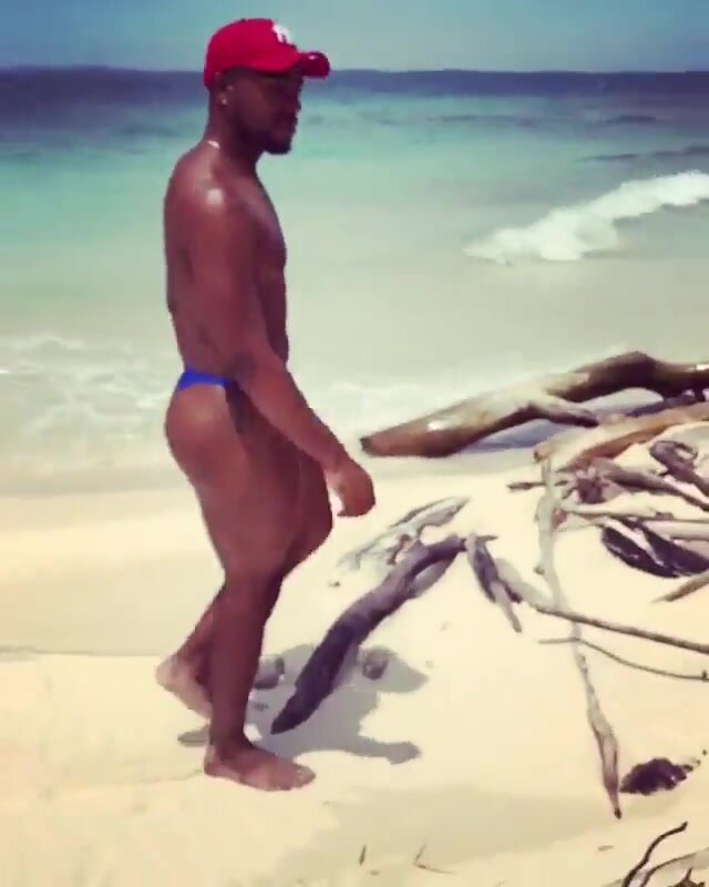 Beefy black guy in thong