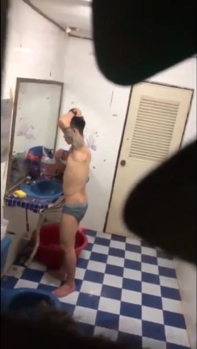 Spy sport man shower in bath room