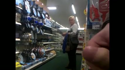 Mature blonde watches some public jerking off